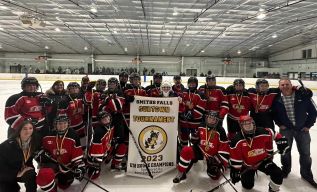 U18 Frontenac Fury team members hoisting the banner after winning the Cubtown tournament in Smiths Falls on Sunday, November 5.